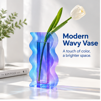 PLIOXOO® wavy acrylic vase with white tulip in bright natural light on white surface – full product beauty shot showing blue to purple gradient and sinuous wave silhouette