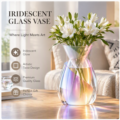 PLIOXOO® iridescent glass vase on white table with candle and books in warm light – Artistic Twist Design text overlay: a unique spiral silhouette that refracts light beautifully, adding elegance to any space; showing full body in pink-blue-gold iridescent glow